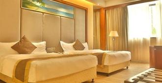 Jie Hao Royal Hotel - Shenzhen - Schlafzimmer
