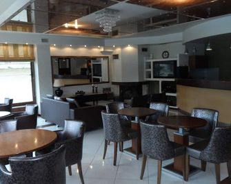 Hotel Prigipikon Suites and sofites - Loutra Ypatis - Restaurante