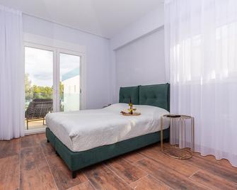 Acrotel Porto Brava Luxury Villas - Nikiti - Makuuhuone