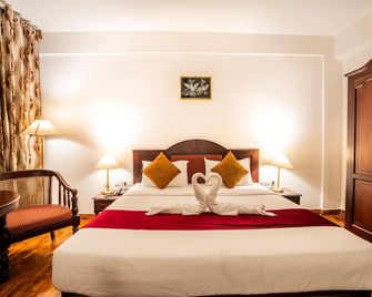 Hotel C7 Munnar - Munnar - Bedroom