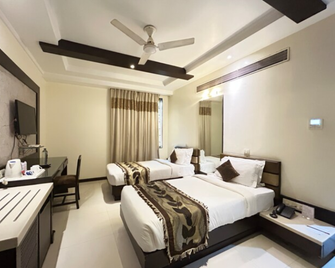 Hotel Royale Ambience - Raipur - Bedroom