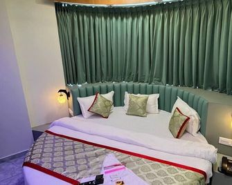 Hotel Melbourne - Gandhinagar - Schlafzimmer