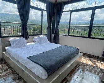 Hotel Boutique Las Isabelinas - Villeta - Спальня