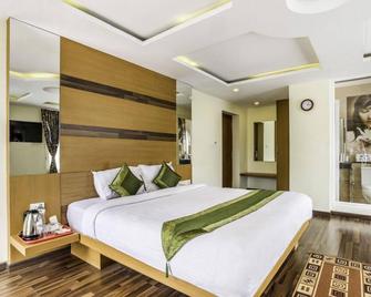 Treebo Abirami Residency - Kodaikanal - Bedroom
