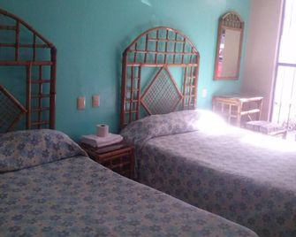 Hotel Angela Carolina - Coatepec - Спальня