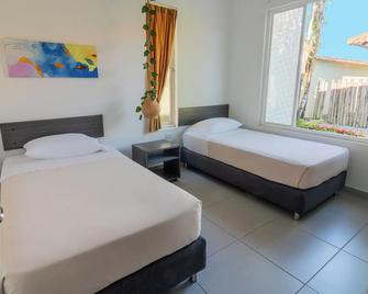 Hotel Paloverde Villas Campestres - Villavicencio - Bedroom