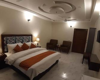 Hotel Executive Lodges - Bahāwalpur - Bedroom