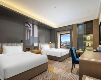 Shuiyi Boqing Hotel - Heze - Camera da letto
