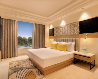Lemon Tree Hotel, Bhubaneswar - Bhubaneshwar - Schlafzimmer