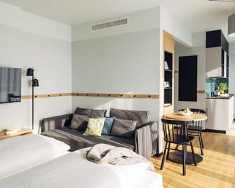 harry's home hotel & apartmens - Lienz - Obývací pokoj