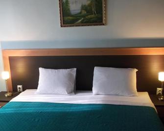 هوتل فيلا سيليا - سكوبي - غرفة نوم