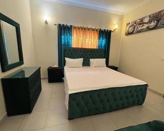 Holidazzle Villa - Karachi - Bedroom