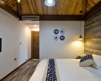 Congqianman Inn - Lishui - Schlafzimmer