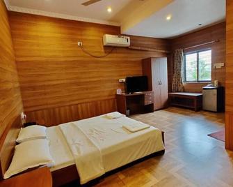 GP Hotels and Resorts - Nashik - Bedroom