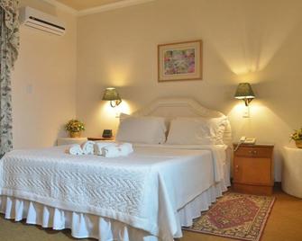 Hotel Ybytyruzu - Villarrica - Bedroom