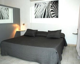 Hôtel l'Orangeraie - Le Lavandou - Habitación