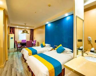 Xinshidai Boutique Hotel (Yichang Shengshi Tianxia) - Yichang - Bedroom