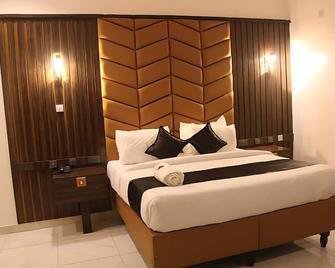 Victorian Bloom Hotel & Resort - Asaba - Habitación