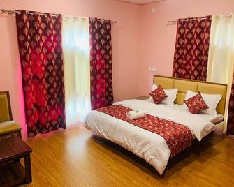 فيزي ريزيدنسي - سريناجار - غرفة نوم