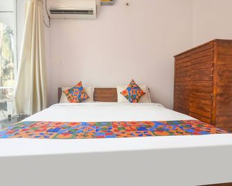Fabhotel Holiday Suites - Nr Benaulim Beach - Benaulim - Schlafzimmer