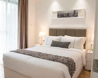 Guangzhou Bio island International Apartment - Cantón - Habitación