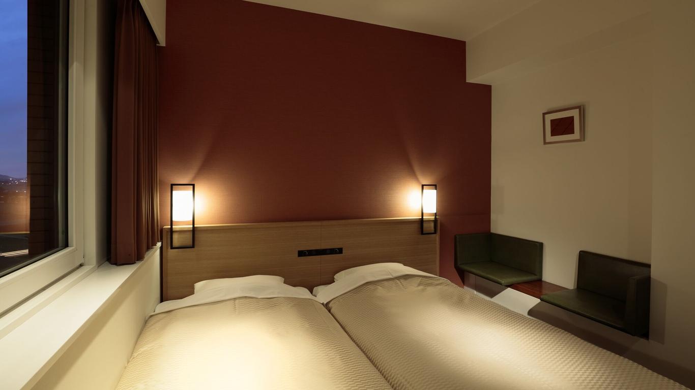 كانديو هوتلز كوماموتو إيربورت أوزو