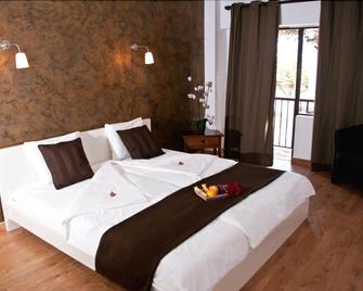 Seven Hostal - Cala Millor - Schlafzimmer