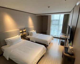 Hanting Express Tai'an Changcheng Road - Tai’an - Bedroom