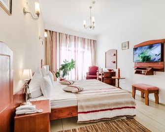 Ezio House - Braşov - Schlafzimmer