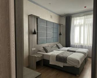 Atrium Hotel - Buchara - Slaapkamer