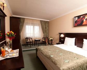 Hotel Rapsodia City Center - Ботошані - Спальня