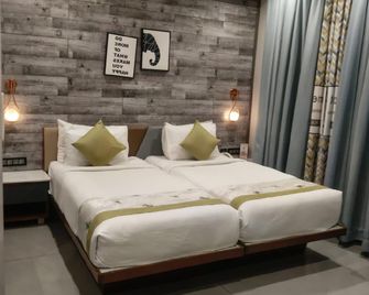 Rg Exclusive Hotel-Akola - Akola - Bedroom
