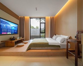 Yining Tinglin Homestay (Six star street) - Ili - Bedroom