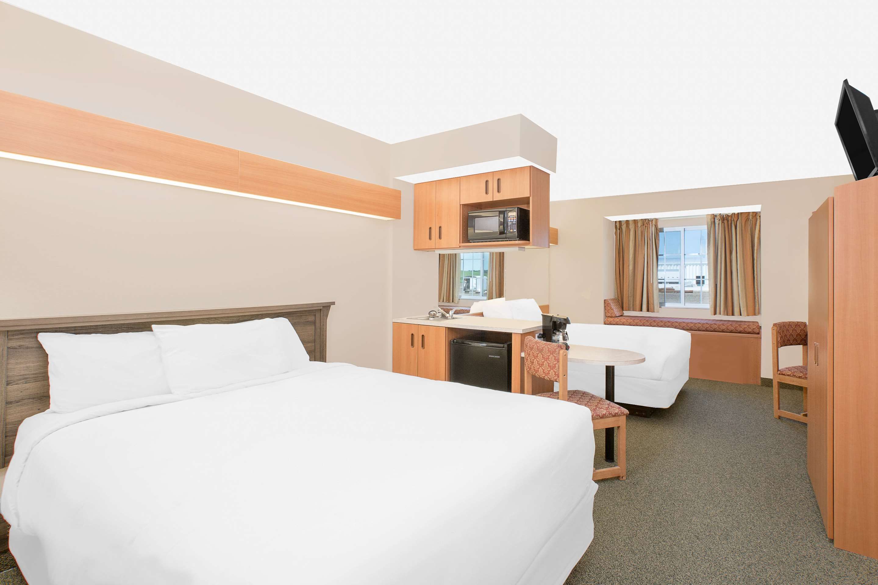 Microtel Inn & Suites by Wyndham Colfax/Newton - Colfax - Schlafzimmer