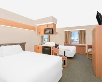 Microtel Inn & Suites by Wyndham Colfax/Newton - Colfax - Schlafzimmer