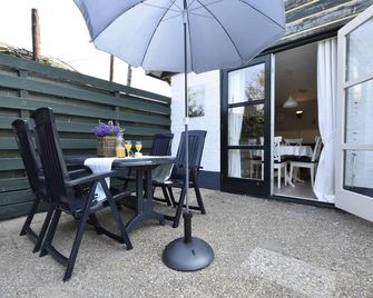 Holiday home in surroundings nearby the coast - 't Zand - Patio