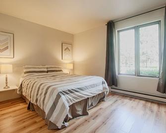 [302] 2 bedroom condo at Mont-Sainte-Anne & near Massif - Saint-Ferreol-les-Neiges - Bedroom