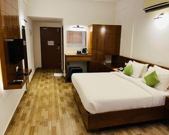 Queens Hotel - Kozhikode - Habitación