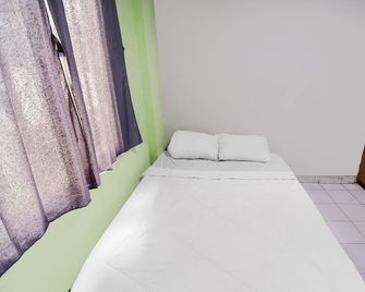 Hotel O Solo Baru 2 Homestay Syariah - Batam - Schlafzimmer