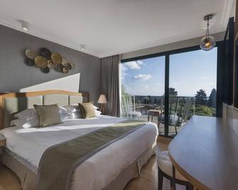 كارمل فورست باي إزروتيل إكسكلوسف - حيفا - غرفة نوم