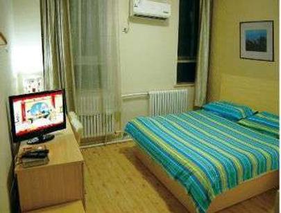 Super 8 by Wyndham Chengde Bi Shu Shan Zhuang - Chengde - Bedroom