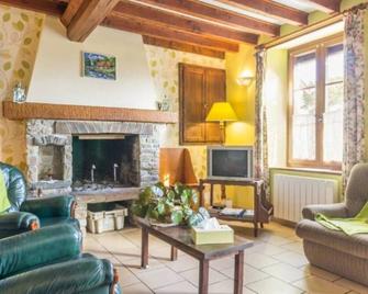 Gîte La Pointe de la Beaumontière - Montchamp - Sala de estar