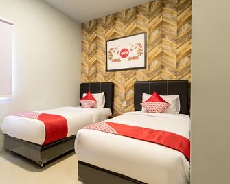 Hotel O Mangaan Residence - Medan - Yatak Odası