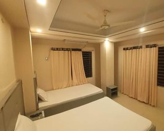 Sylhet Hotel Grand Usman - Sylhet - Camera da letto