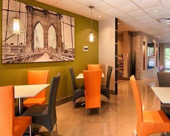 Days Inn & Suites by Wyndham Bonita Springs North Naples - Bonita Springs - Restaurante