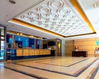 Jingsheng Hotel - Leshan - Leshan - Front desk