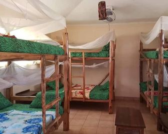 Climbers Home - Moshi - Schlafzimmer