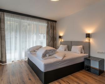 A Casa Rubin Chalet & Studio Resort - Sölden - Sypialnia