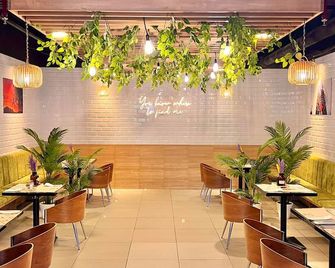 Madison 101 Hotel + Tower - קזון סיטי - מסעדה