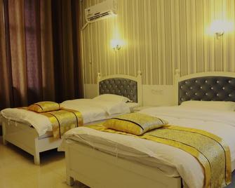 Zhangjiajie 26 Degree Theme Hostel - Zhangjiajie - Schlafzimmer